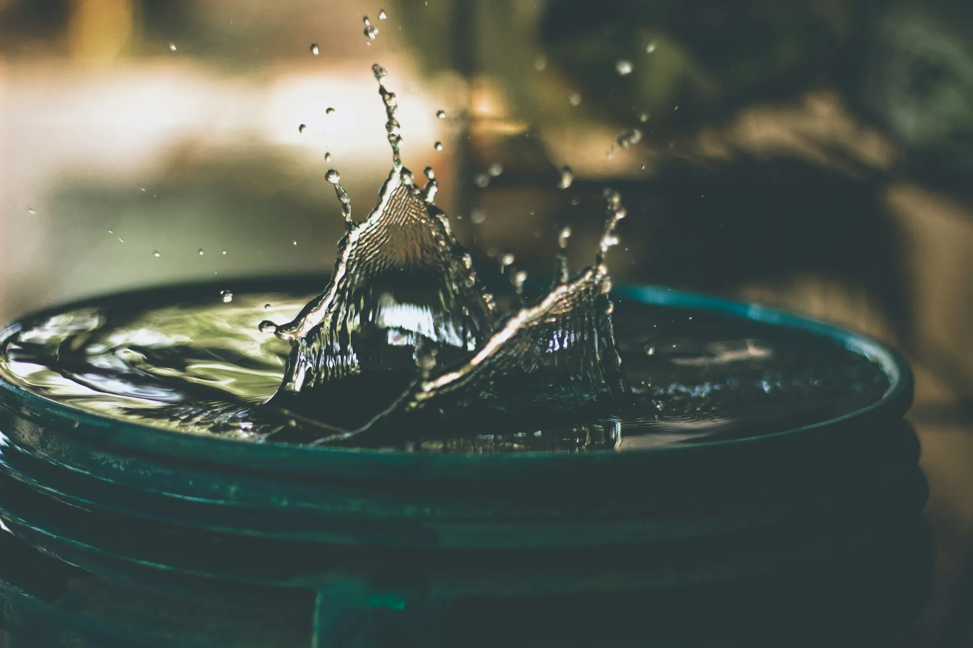 Water drop on bucket showing proper water storage container